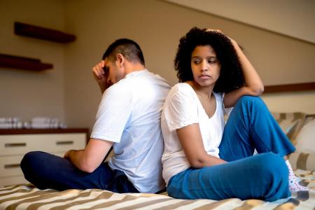 How does stress affect fertility in women and men?